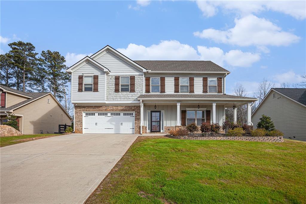Welcome home to this charming property that boasts a cozy fireplace, natural color palette, and a center island in the kitchen. The kitchen features a nice backsplash and plenty of space for cooking and entertaining. The master bedroom includes a walk-in closet, with other rooms providing flexible living space. The primary bathroom is a retreat with a separate tub and shower, double sinks, and good under sink storage. Step outside to the fenced backyard with a sitting area, perfect for enjoying the outdoors. Don't miss out on this fantastic opportunity to make this house your new home!