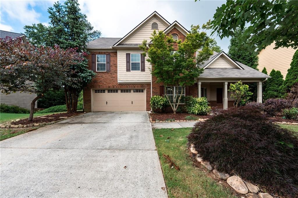 Welcome to this beautifully maintained brick-front home that blends space, comfort, and everyday style. From the inviting covered front porch to the light-filled interior, this home is designed to impress. The formal dining room features elegant coffered ceilings, while the open-concept family room with a cozy gas fireplace flows seamlessly into the kitchen—complete with granite countertops, tile backsplash, breakfast bar, and a spacious dining area overlooking the backyard.
A main-level bedroom and full bath offer flexible space for guests or a home office. Upstairs, enjoy a large loft perfect for a second living room, playroom, or media space. The oversized primary suite feels like a true retreat with vaulted ceilings, a spa-style bath, and a walk-in closet. Three more bedrooms and a full bath round out the upper level.
Outside, the fully fenced, level backyard offers privacy and plenty of space for relaxing or entertaining. Plus, a new roof installed in April 2025 means peace of mind from day one. This move-in-ready home offers the space you need with the updates you want—don’t miss it!