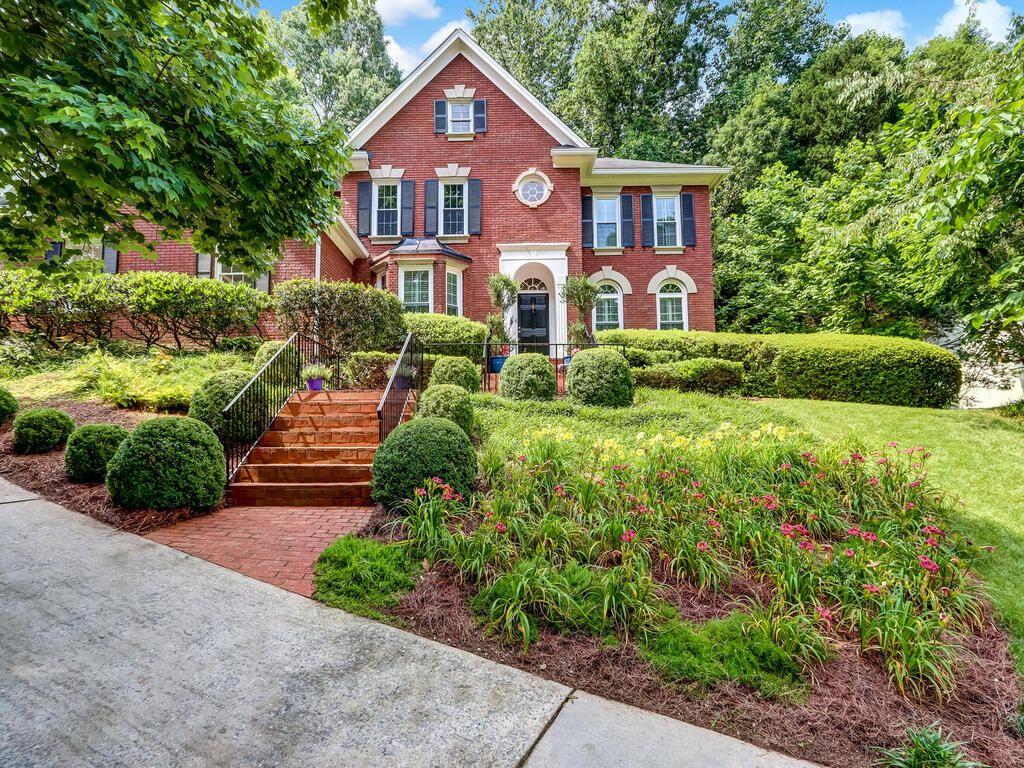 Welcome to the swim/tennis community of Vinings Glen. From the moment you walk in to this spacious and lovingly maintained home, you'll feel right
at home. The 2-story foyer creates an inviting entrance, flanked by a separate living room/home office space and an open dining room. The fireside
Great Room features amazing molding and custom bookcases, overlooking the white and bright kitchen and breakfast room with stone counters,
breakfast bar, stainless appliances, and a walk-in pantry. Enjoy your morning coffee in the 3 seasons sunroom that runs along the back of the home,
providing a lovely view of the beautiful backyard. The main level also includes an ensuite guest room, a half bath, and a laundry room. Hardwood floors
adorn the main level and upstairs halls, leading you to the large primary suite with a relaxing spa-like bath. There are two additional bedrooms with
ample closet space and a full bath. The daylight lower level offers plenty of space for recreation, a potential gym, guest suite, home office areas/flex rooms, and ample storage. It includes newer HVAC systems. The oversized screened porch is perfect for outdoor relaxation and overlooks the deck with a brand
new hot tub. The yard is lushly landscaped, adding to the overall appeal. Conveniently located close to all that Smyrna has to offer and provides easy
access to main roads and all ATL. It is also nearby The Battery, providing additional entertainment and amenities. It combines comfort, style, and
convenience, a great place to call home. Be sure to check out the new double pane insulated windows, new gutters and new gutter guards too!