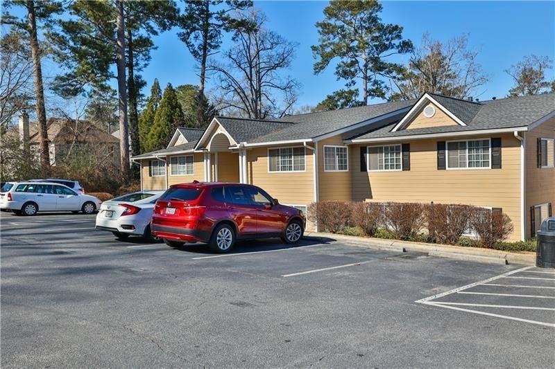 Discover the epitome of luxury living in this stunningly renovated 2-bedroom, 2-bathroom condo located within the gated community of Carlyle Woods in Brookhaven. Boasting a newly updated white kitchen with stainless steel appliances, renovated bathrooms for your relaxation, and custom built-ins in the primary bedroom providing ample storage, every detail exudes comfort and style. Enjoy access to an array of amenities including a state-of-the-art fitness center, resort-style swimming pool, and meticulously landscaped grounds ideal for leisurely strolls or outdoor gatherings. With gated entry and assigned parking ensuring security and peace of mind, convenience is paramount. Positioned for effortless living, indulge in a variety of dining options, bars, and entertainment venues within walking distance. Close proximity to Children's Hospital, Chamblee, Buckhead, and easy access to I-85 and Buford Highway's culinary delights further enhance the appeal. Move-in ready and awaiting your personal touch, seize the opportunity to experience the pinnacle of Brookhaven living.