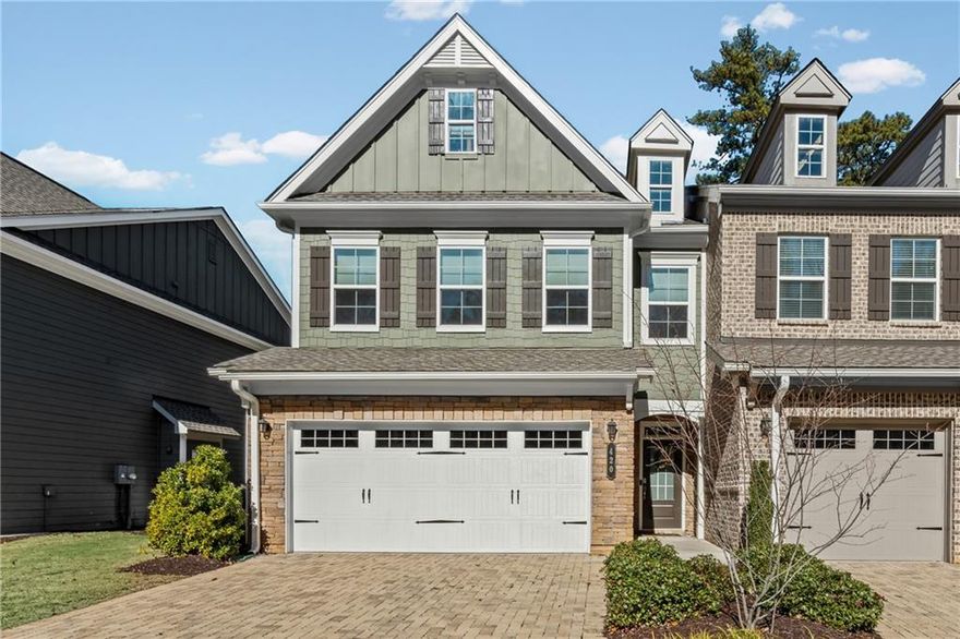 Upscale Living Meets Everyday Comfort in This Distinctive Alpharetta Townhome
Welcome to Artisan, one of Alpharetta’s most desirable communities, where modern design, comfort, and convenience come together beautifully. This rare end-unit townhome offers exceptional privacy, abundant natural light, and effortless access to Avalon, Downtown Alpharetta, and the Ameris Bank Amphitheatre.
Step inside and experience a bright, open floor plan designed for both entertaining and relaxation. The chef-inspired kitchen is the heart of the home, showcasing a large granite island, stainless steel appliances, plentiful cabinetry, and a walk-in pantry. Whether you’re enjoying your morning coffee at the breakfast bar or hosting friends in the elegant dining area, this space is made for connection and style.
The spacious living room is filled with sunshine from oversized windows, while a cozy fireplace sets the perfect mood for relaxing evenings.
Upstairs, unwind in the luxurious primary suite featuring a tray ceiling, big walk-in closet, and a spa-style bath with dual vanities, soaking tub, and glass-enclosed shower. Two additional bedrooms and a full bath offer flexibility for guests, family, or a home office.
A true standout feature, the upstairs bonus area provides extra living space you won’t find in other units, ideal for a media room, reading nook, or playroom. Convenience continues with an upstairs laundry room, smart home features, and energy-efficient systems throughout.
Residents enjoy access to a sparkling community pool and playground, a great kids park, plus easy proximity to top-rated North Fulton schools, with Fulton Science Academy within walking distance, GA-400, the Alpha Loop, and scenic Greenway trails.
Move-in ready and thoughtfully upgraded, this exceptional end-unit townhome delivers the perfect blend of modern sophistication, comfort, and privacy in an unbeatable Alpharetta location.  
Schedule your tour today and fall in love with your next home.