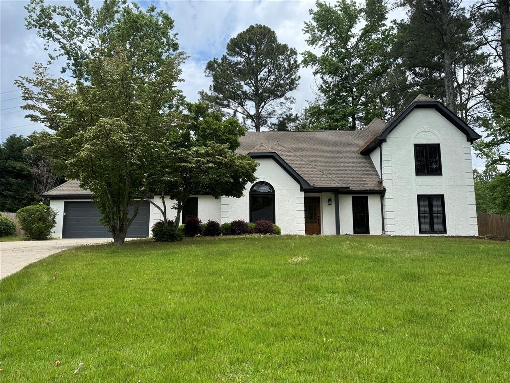 Very spacious East Cobb home with a private, fenced backyard! Ready for immediate move-in. Quiet location, convenience for shopping, schools, and amenities are all nearby! Spacious main level has lots of natural light, vaulted ceilings with views of the level yardspace. Second level features generously sized bedrooms high ceilings, (just cleaned) carpet, closet + walk out attic storage, and a large Jack-n-Jill bath. Spacious garage with a storage room and access to the backyard. Incredible East Cobb schools!