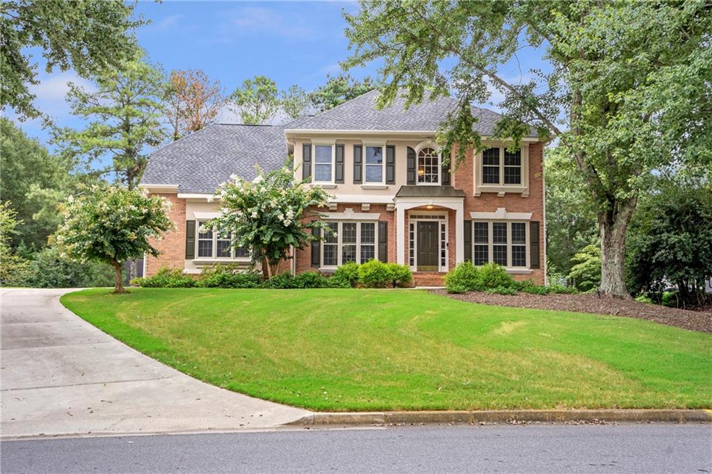 Welcome to Brierfield, one of Alpharetta’s most sought-after swim/tennis neighborhoods located in North Fulton's highly rated school districts of Crabapple Crossing, Northwestern, and Milton High school. This five-bedroom, four-and-a-half-bath home features a finished terrace level, freshly painted exterior and interior, a 2yr old roof, oversized laundry room & mud room, and an expanded deck with a covered porch - perfect for entertaining or just relaxing. The open floor plan has a spacious dining room with coffered ceiling, home office, and a bright kitchen with a spacious breakfast bar overlooking the fireside family room with built-in cabinetry. Upstairs, the owner's bedroom is impressive with a spa-inspired en-suite with a frameless, glass shower, luxurious soaking tub, and walk-in closet. Four additional bedrooms with hardwood flooring and a renovated hall bathroom complete the lovely second floor living space. The versatile terrace level has a full bathroom and provides the perfect flex space for an exercise room, playroom, media lounge, secondary family room and space for your guest. Brierfield is a wonderful community with a popular neighborhood pool, clubhouse and tennis courts. Convenient to shopping, entertainment, restaurants, nightlife, and lots of activities, the location is unbeatable - Just 2 miles from the Heart of Downtown Alpharetta, 1.3 miles to Milton’s Crabapple Market District, 3.6 miles to Avalon, 6 miles to Roswell’s Downtown Historic District, 4.4 miles to Ameris Bank Amphitheater, and super easy access to GA 400, just 3.7 miles away. Convenience, beauty, and fun for everyone - Imagine yourself at 445 Briars Bend!