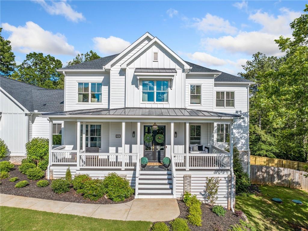Price Improvement! Luxury Redefined in Woodstock – RESORT-STYLE LIVING with DESIGNER FINISHES, SALTWATER POOL & TRUE IN-LAW SUITE.
Welcome home, where timeless design meets modern luxury in one of Woodstock’s most coveted enclaves. Tucked away in one of Woodstock’s most desirable areas, this like-new custom home is a true gem that checks every box for today's discerning buyer, not to mention this West facing home gets the most beautiful sunsets on the front porch. From the brand-new in-ground fiberglass saltwater pool to the meticulously finished terrace level, this exceptional residence offers a rare blend of architectural elegance, true multigenerational functionality, and resort-level outdoor living - all on a beautifully landscaped almost 1.5 acre lot with uncompromising privacy.
Key Features of this STUNNING home:
BRAND-NEW in-ground fiberglass saltwater heated pool and spa with custom hardscaping – a private backyard oasis ideal for entertaining or unwinding in style.
True in-law suite (Teen Suite, Airbnb, or Income Producing Suite) with its own entrance within the 3-car garage. This space also includes a beautifully designed full kitchen complete with 2 beds, 2 full baths, office, living room, huge walk-in pantry, laundry room, plus your own private covered patio – all fully integrated and accessible from the main home or independently.
3-car garage is a must-have with private suite access plus generous storage in lower level.
Chef’s kitchen featuring quartz countertops, refrigerator, pot filler, oversized islands, and custom cabinetry.
Designer-curated finishes throughout, including hand-selected tile work in baths and laundry, hardwood flooring, and California-style walk-in closets.
Screened-in back porch with fireplace offering panoramic views of the pool and gardens – your year-round outdoor living room and perfect entertaining space.
Beautifully designed dedicated office, massive upstairs flex/media room, and exercise suite that easily converts to a 7th bedroom or creative studio.
All nestled in a quiet, established neighborhood just MINUTES from downtown Woodstock, top-rated schools, and private clubs. Schedule your private tour today!
