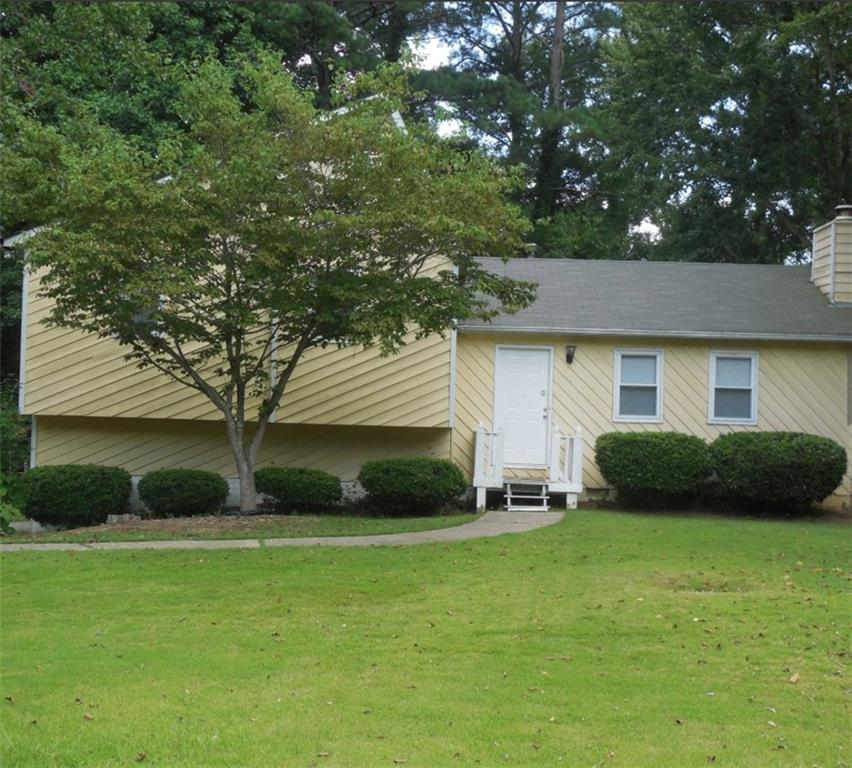 This charming 3-bedroom, 2-bathroom home features a cozy family room and an open dining area. It includes stainless steel appliances and white cabinets in the kitchen, as well as a garage for one car and additional storage. The fenced yard offers privacy with a wooded backdrop, complete with a fire pit and a nice patio for entertaining. Located in a well-maintained subdivision with no HOA, it boasts a beautiful yard and conveniently located to schools, shopping, and restaurants.