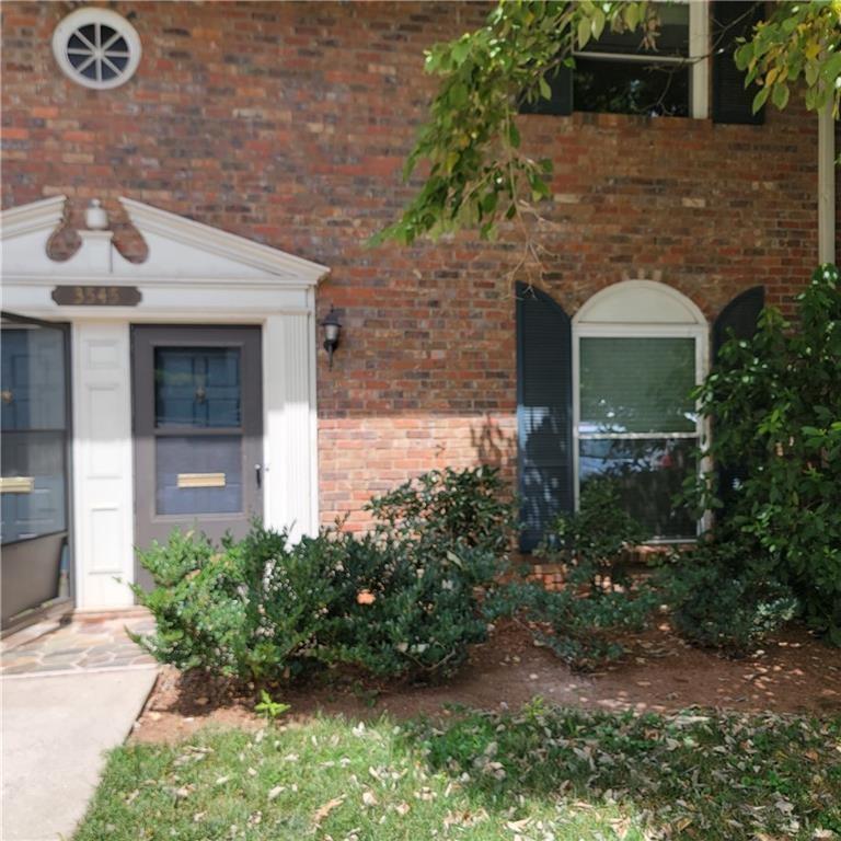 **Location, Location, Location!** Discover this beautifully maintained two-bedroom townhome, constructed from durable four-sided brick, perfectly situated in the heart of the city’s major thoroughfares. Enjoy the convenience of being just moments away from a variety of shopping options, making daily errands a breeze. Step inside to find a private patio adorned with elegant wood tiles, perfect for outdoor relaxation or entertaining guests. The entire house boasts stunning hardwood floors that enhance the warm and inviting atmosphere throughout. The generous living room offers ample space for comfort and leisure, while the spacious separate dining room provides the ideal setting for family gatherings or dinner parties. The kitchen features gorgeous granite countertops and an abundance of cabinetry, providing both style and functionality for any home chef. Convenience is key with an extra-large half bathroom located on the main floor, conveniently attached to the laundry area for easy access. This remarkable townhome is a must-see and is sure to move quickly—don’t miss your opportunity to make it yours! The Homeowners Association (HOA) provides a range of services, including exterior maintenance, grounds upkeep, pest control, trash collection, and water—ensuring a hassle-free living experience.