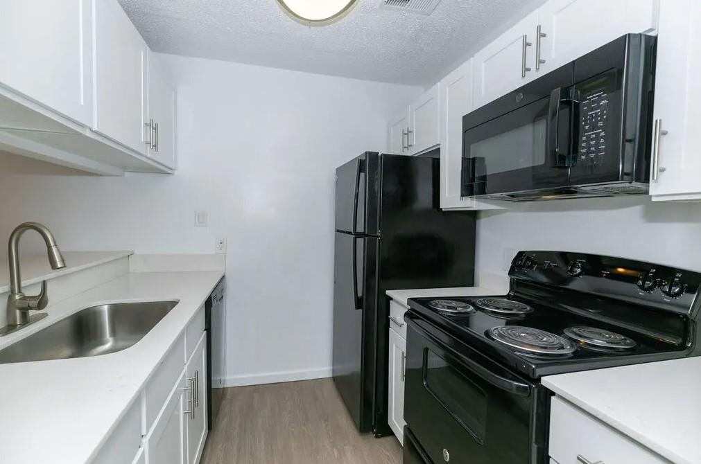 Playground, Dog Park, Pavilion with BBQ & Picnic areas, Controlled Access Gate, Tennis, Pool, & Fitness Center. Easy access to I-75 & 285, Business Center, Spacious Walk-in Closets, Wood Burning Fireplace in select homes, Private balcony/patio, W/D provided in select homes.