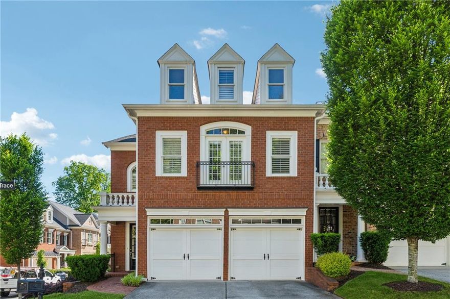 Beautiful End Unit in Academy Park with Private Fenced Courtyard.  Enjoy tons of natural light with 3 sides of windows accented by Plantation Shutters throughout!  The main level boasts true hardwoods which start with an elegant foyer and flow into a dining room that can easily accommodate a large gathering.  The living room has a gas fireplace which is next to the breakfast area and spacious kitchen with tons of storage space and Craftsman style cabinetry.  Out the back is an expansive private courtyard that is perfect for entertaining, gardening, pets, or just enjoying the sun.  On the second floor you'll enjoy a luxurious primary suite with vaulted ceilings, bathroom with a spa bath whirlpool tub, dual vanities, walk in shower, and 2 walk in closets.  Down the hall is an office nook, additional storage, laundry room and 2 guest bedrooms that share a Jack n Jill full bathroom.  The 3rd floor offers endless potential as a flex space, home gym, office or additional bedroom as the large walk in closet can be converted to a full bathroom as well.  The property was in the middle of redoing flooring and now allows the buyers to come and pick their own options throughout!  You'll also enjoy 2 car garage with high ceilings for additional storage if needed.  Conveniently located right near the amenities, ample guest parking, and nature trail entrance for the Alpha Loop access.  Enjoy the amenities with lighted tennis/pickleball courts, Jr. Olympic swimming pool, clubhouse, fitness center & onsite management. The community has direct access to the Alpha Loop with resident gates opening right to Avalon on one side and Downtown Alpharetta on the other! Enjoy all the festivals, farmers market, restaurants and shops just minutes from your door!