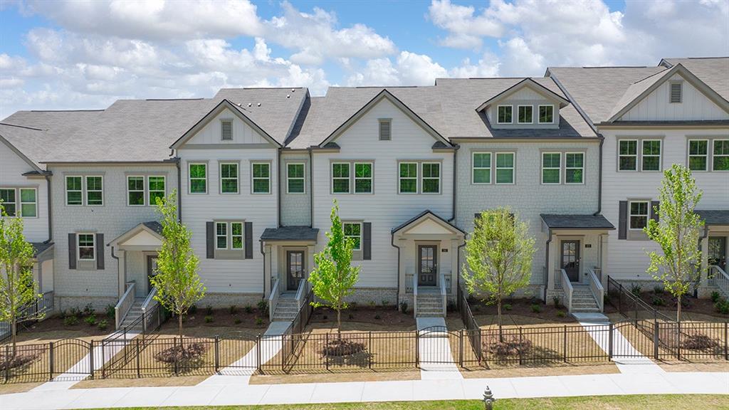 Beautiful Brand-New Townhome located in the heart of Towne Lake!! This home features an open floorplan on main level with kitchen island overlooking living room and dining area. Large private outdoor deck space is perfect for grilling out and relaxing. Master bedroom is generous in size and features a stunning bathroom and huge walk-in closet. This home is sure to impress with plenty of upgrades. This one won't last long.