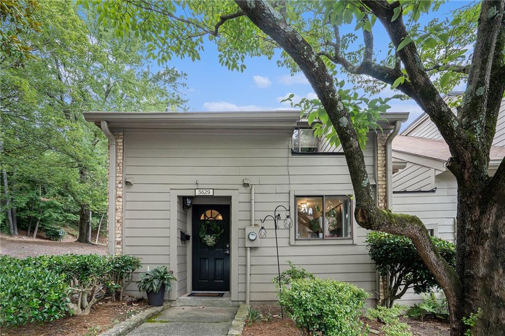 Discover the most cost-effective city living in the area—this beautifully updated condo offers unbeatable value, style, and location. Enjoy the convenience of being within walking distance to fine dining, Cumberland Mall, Cobb Galleria, and The Battery, and less than 5 minutes from major highways I-75 and I-285, making commuting and entertainment effortless. From the moment you arrive, you’ll be impressed by the great curb appeal, lush landscaping, and welcoming entryway. Inside, brand-new flooring flows into a spacious living area, where newly added architectural beams create the vaulted high-beam ceilings, adding warmth and sophistication. This home is perfect for professionals, first-time buyers, or anyone seeking an elegant, low-maintenance lifestyle in an exceptional location at an affordable price. Don’t miss your chance to own one of the best values in metro Atlanta!