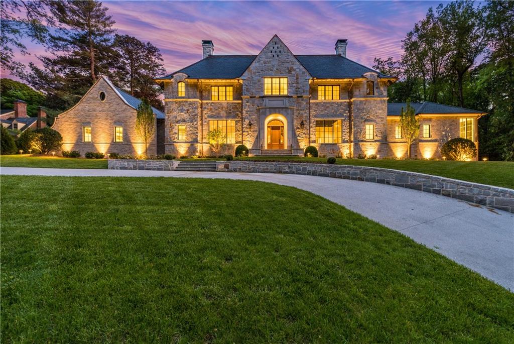 Elegant new construction by award winning Harrison Design and builder Patrick Sheehan. Perfectly sited on a beautiful 2 acre lot, this English Country Manor house is perfect for entertaining. Lots of natural light, high ceilings, hardwoods throughout, covered patio and outdoor fireplace off the keeping room, flat walk out yard ready for the buyers pool design. Unfinished terrace level with tons of space. Chefs kitchen with high end appliances opens to cozy keeping room with fireplace. Elevator and 4 car garage.