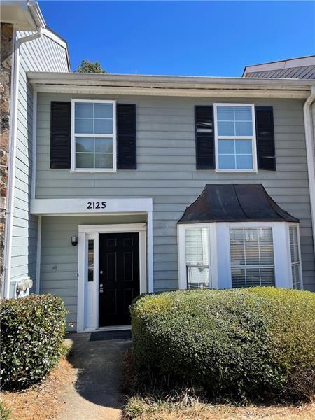 Charming 2 bedroom/2.5 baths townhome in PRIME location! Spacious and open floor plan. Bright and updated Kitchen features eat-in area, breakfast bar and newer appliances. Excellent roommate floor plan with walk-in closets and private bathrooms. Conveniently located to I-75 & I-575. Minutes to KSU, Town Center Mall, Pine Tree Country Club and much more. A MUST SEE!