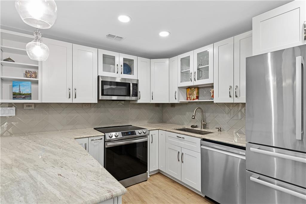 Fully Renovated Smyrna Condo Just Minutes from The Battery!
Welcome to 2794 Farmstead Road—a beautifully remodeled 2-bedroom, 1.5-bath condo located in the heart of Smyrna’s sought-after Farmstead community. This move-in-ready home features a stylish modern design, an open concept main level, and an oversized private deck, perfect for relaxing or entertaining. With premium updates throughout including newer appliances, water heater, and HVAC that comes with a transferrable warranty, plus the location which puts you just under 1.5 miles—or a 25-minute walk—from The Battery Atlanta and Truist Park, you’ll love calling this place home.
Step inside to a bright, open floor plan that features new flooring, fresh neutral paint, and updated lighting. The spacious living and dining areas flow seamlessly into the fully updated kitchen, which boasts stainless steel appliances, quartz countertops, modern backsplash, and plenty of cabinetry. A remodeled half bath and barn door storage nook add extra charm and functionality to the main level.
Upstairs, you'll find two spacious bedrooms with ample closet space and a sleek, modern full bathroom. Whether you're working from home, hosting guests, or just enjoying a quiet evening in, this home checks every box.
The back deck is a showstopper—expansive, private, and perfect for hosting friends and family or enjoying your morning coffee. With lush wooded views and space to garden or relax, this outdoor area adds a true sense of retreat.
The Farmstead community offers fantastic amenities, including assigned parking plus plenty of visitor parking, a swimming pool, and a clubhouse, all in a quiet, well-maintained neighborhood. Plus, you're in a prime location just minutes from:
The Battery Atlanta & Truist Park (Braves games, shopping, dining, concerts)
Cumberland Mall
Silver Comet Trail
I-75 and I-285 access
Downtown Smyrna Market Village
Top restaurants, grocery stores, and fitness centers
This condo is ideal for first-time buyers, downsizers, savvy buyers, or anyone looking to enjoy a low-maintenance lifestyle in a highly connected area.
Don’t miss your opportunity to own this modern and affordable home in one of the most vibrant and convenient areas of Metro Atlanta. Schedule your private showing today—LEASE PURCHASE OPTION AVAILABLE.