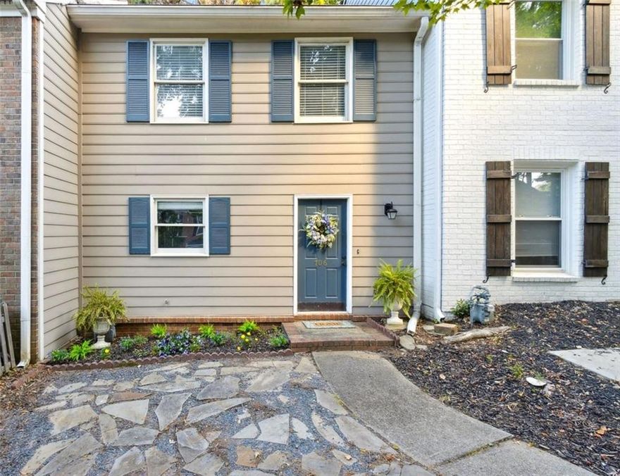 Smart Move—For Nesters, Investors, and Everyone in Between! Now newly refreshed in price, this Marietta townhome delivers comfort, convenience, and value in one perfect package. The bright kitchen with breakfast nook flows into a separate dining area and a fireside living room featuring a charming brick fireplace—perfect for cozy evenings. Step out to a private deck framed by wooded views ideal for relaxing or grilling. Upstairs, two oversized bedrooms each feature ensuite baths, offering flexibility for guests, roommates, or a home office. All appliances remain, including the upstairs laundry, for an easy move-in. With no rental restrictions and a voluntary HOA, this home is ideal for homeowners or investors. Located minutes from I-75, Marietta Square, Truist Park, KSU, shopping, and dining—this refreshed opportunity defines Marietta living at its best.