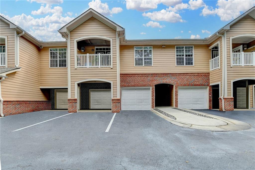 10K Price improvement!! Can't beat this price! Welcome to easy living in this 2-bedroom, 2-bath condo located in a gated community with a sparkling pool and included exterior maintenance. Enjoy the comfort of a spacious primary suite featuring a large bathroom and walk-in closet. plus, the convenience of a drive-under garage, this home offers style, security, and low-maintenance living all in one package.