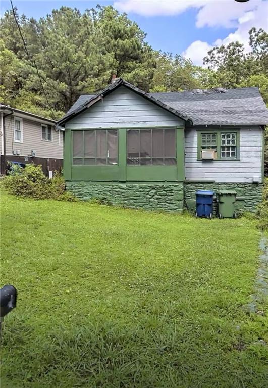 City views in Atlanta with 2 beds 1 bath built in 1952. 2236 SqFt of potential. Don't miss this rare opportunity to own a piece of historic Atlanta, just minutes from Mercedes-Benz Stadium, the BeltLine, West End, and all the new development surging through the area. The home is in need of renovation, making it a perfect project for builders, investors &/or savvy homeowners looking to restore or reimagine. The bones are solid, a classic layout and generous front and backyard ideal for expanding or adding ADU. Zoned R-5 offering flexibility for single-families. Located .05 miles from Clark Atlanta Univ., Morris Brown College & Morehouse College. Surrounded by revitalization, this property has tremendous upside potential. Square Ft and Acres may vary.