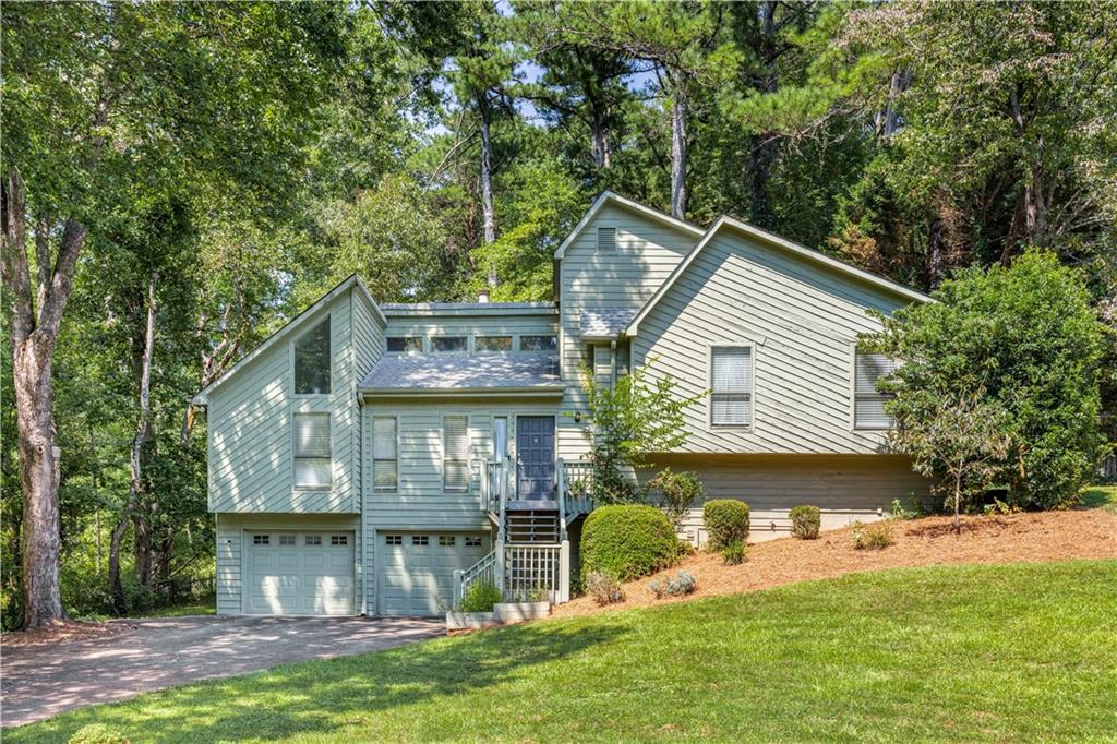 Discover your dream home at 1877 Falcon Wood Drive NE, Marietta, GA. This charming 4-bedroom, 2.5-bathroom residence offers the perfect blend of comfort and style, sprawled across 2,400 square feet of living space. Situated on a generous 14,784 square foot lot, this property promises ample room for both indoor and outdoor living.
Step inside to find an open and inviting living area with beautiful hardwood floors that seamlessly transition to cozy carpet in the bedrooms, ideal for relaxation and entertaining. The home features a modern kitchen and a convenient laundry room that adds to the practicality of daily living.
The basement offers a versatile playroom space, perfect for hobbies or a recreational area.
Outdoor enthusiasts will love the private backyard oasis, complete with a deck for barbecues and gatherings. The community amenities include a playground and tennis court, providing endless opportunities for recreation and leisure.
This home invites you to create lasting memories in a modern setting while enjoying all the comforts you desire. Don't miss the opportunity to make it yours!