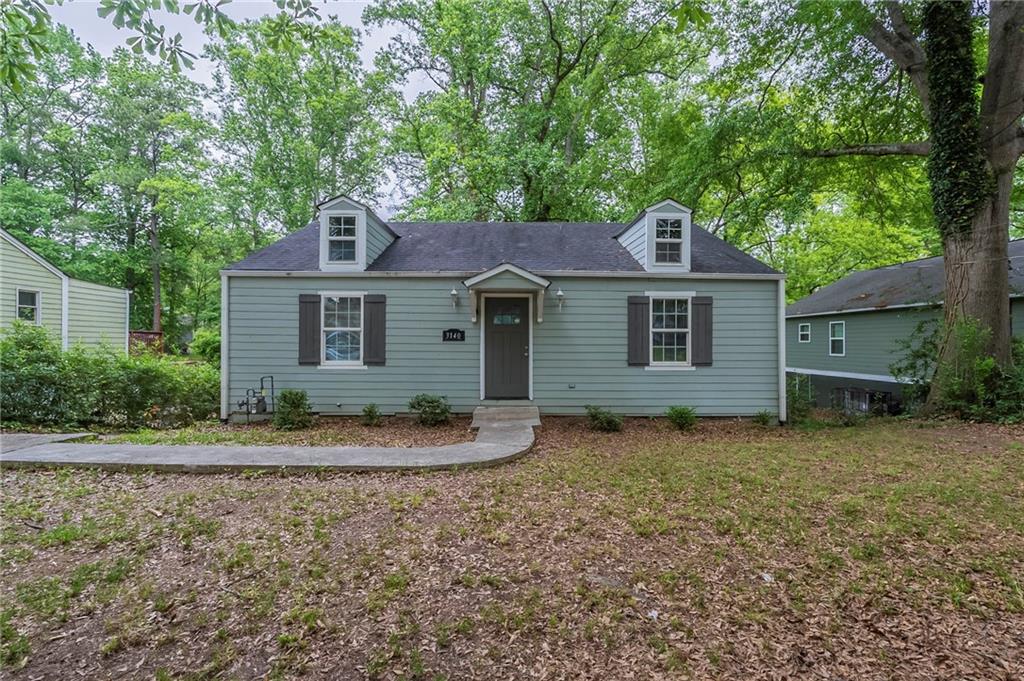 This beautifully updated 3-bedroom, 2-bath ranch home in East Point offers stylish finishes and an open floor plan perfect for modern living. The kitchen features granite countertops, stainless steel appliances, and a counter-to-ceiling subway tile backsplash. A private ensuite in the primary bedroom includes a floor-to-ceiling tiled shower and a sliding barn door for added charm.
Enjoy outdoor entertaining on the back deck overlooking a level, fenced backyard. Located less than five minutes from downtown East Point, this home combines character, location, and convenience—ideal for first-time buyers or investors looking for a turnkey opportunity in Fulton County.