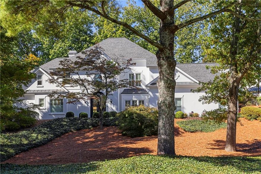 Thoughtfully renovated and expanded in 2023, and nestled on a private cul-de-sac in one of Sandy Springs’ most desirable neighborhoods with a premier location, 5800 Declaire Ct offers approximately 4,400 square feet of beautifully designed living space in the highly sought after Heards Ferry ES/Riverwood HS school district.  Soaked in natural light, the main level welcomes you into a grand foyer transitioning into open concept living and dining spaces complete with french doors flowing into a carefully expanded and private,  flat backyard space, perfect for entertaining.   The home features 6 bedrooms and 4.5 bathrooms with the primary suite on main, offering his and hers walk-in closets and a separate sitting room that opens to the private backyard.  Finishing out the first floor are a separate breakfast room, an updated kitchen with a keeping room featuring vaulted ceilings and a second fireplace as well as additional views into the backyard.  Upstairs has all the room for modern living.  With five bedrooms and three full bathrooms combined with additional flex space and ample storage, there is room for everyone.  Walkable to downtown Sandy Springs and with easy accessibility to shopping, dining, schools, and three major hospital systems, this home truly has it all!