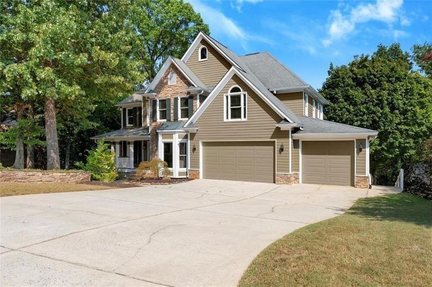 Incredible NEW PRICE on this impeccably maintained Hardage Farm showstopper with awe-inspiring Kennesaw Mountain views! Perfectly situated on a cul-de-sac lot in the highly desirable West Side Elementary School District, this move-in ready home features 4 bedrooms, 3.5 baths, and a full finished daylight basement. Recent upgrades include a brand-new HVAC, new water heater, fresh landscaping, new carpet and paint.

Step inside to find gleaming hardwood floors and a soaring two-story fireside great room. The chef’s kitchen impresses with custom Thomasville cabinetry, Wolf gas range and hood, paneled appliances, and luxurious granite counters. Upstairs, four bedrooms offer plush carpet, custom Elfa closets, and glorious mountain views. The primary retreat boasts a renovated bath with dual marble vanities, soaking tub, and separate shower.

Enjoy multiple outdoor living spaces — two decks, a screened porch, and a covered patio — all designed to take in the breathtaking scenery of Kennesaw Mountain National Park. The finished terrace level expands the living space with a full bath, kitchenette, private bar, optional 5th bedroom, recreation area, and family room. Neighborhood amenities include a clubhouse, pool, tennis, pickleball, playground, and fishing pond, plus direct access to Kennesaw Mountain Battlefield Trails. Minutes to Marietta Square, Marietta Country Club, and The Avenues. Live your best Marietta lifestyle today!