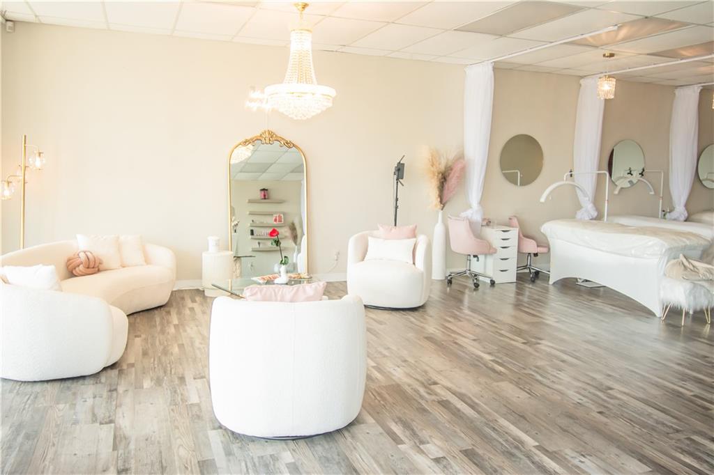 Turnkey Lash Studio & Body Bar for Lease – Fully Equipped
Move-in ready commercial space available in a busy shopping strip, perfect for a lash studio and body bar. This unique opportunity includes all the essential equipment for a lash tech, featuring professional lash beds, chandeliers, and all necessary setup for a seamless start.
The layout includes: Spacious open area for client services. One private office in the back for storage or consultations. One bathroom. Two entrances – a convenient front entrance for clients and a private rear entrance for staff. Ample parking in a large shared lot. Located in a high-traffic strip mall with great visibility, this space is ideal for someone who wants to start their studio without the hassle of purchasing furniture or equipment. All utilities are included in the rent, making this a simple, low-commitment way to launch your beauty business. Perfect for lash artists, body contouring specialists, or anyone seeking a ready-to-go studio in a prime location!