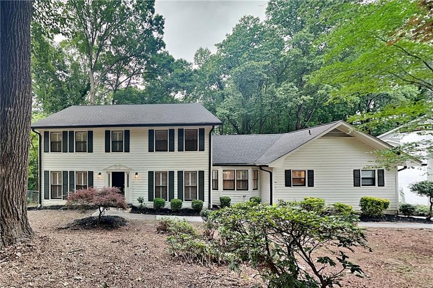 247 Millbrook Farm Rd, Marietta, GA 30068

Discover your dream home in this beautifully updated and maintained traditional-style home. This 5-bedroom, 4.5-bathroom gem offers approximately 4,488 square feet of thoughtfully designed living space.

Property Highlights:
• Inviting open floor plan with seamless flow between living spaces
• Large living room featuring a cozy fireplace
• Spacious kitchen boasting granite countertops, stainless steel appliances, large island with seating, and ample cabinet space
• Generous master retreat with luxurious en-suite bathroom and walk-in closet
• Gleaming hardwood floors throughout main living areas
• Attached two-car garage

Step outside to your private backyard and deck, perfect entertaining. The fenced and wooded lot provides a sense of privacy and serenity.

Situated in an established neighborhood, this home grants easy access to schools, shopping destinations, and dining options. Enjoy quick commutes via nearby roadways and highways, putting you just moments away from all the area has to offer.

Don't let this opportunity slip away – schedule your private tour today and make this house your home!