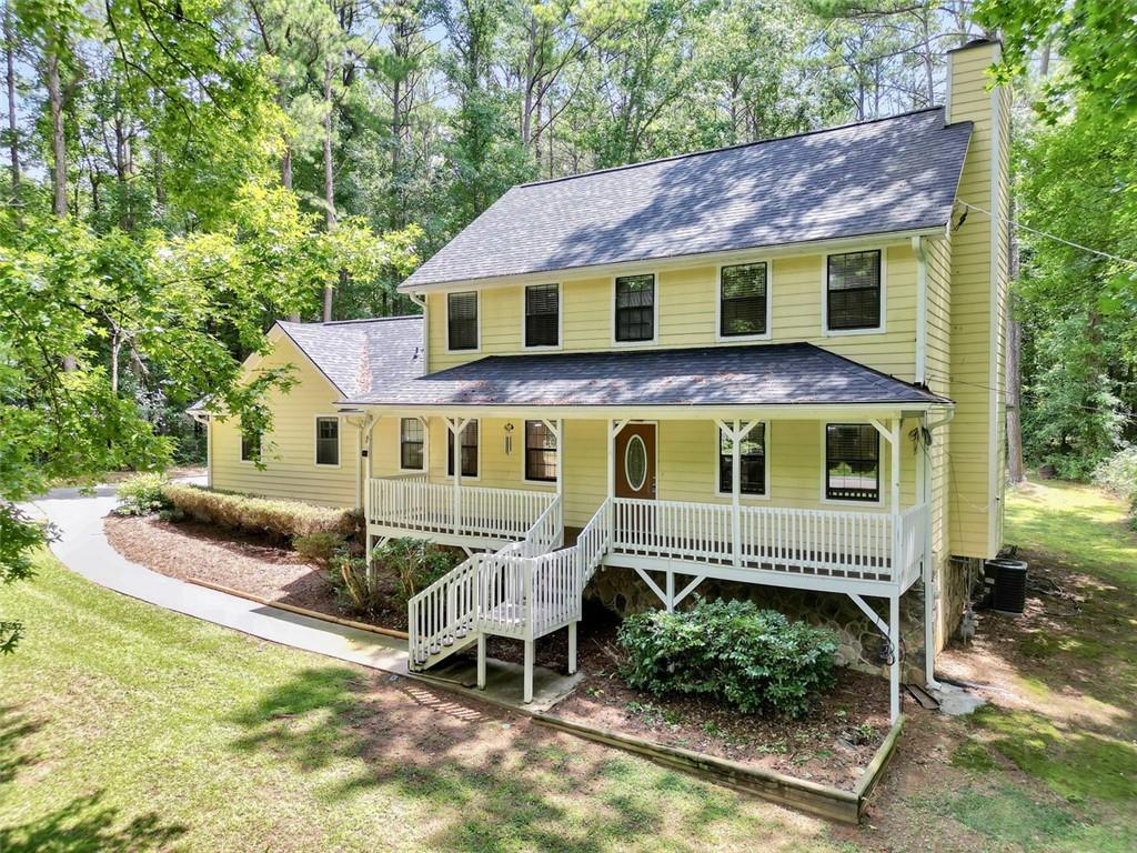 Nostalgic elegance is how best to describe this one. Nestled away in the desirable Oak Forest Subdivision, this meticulously cared-for property is exactly what you've been looking for. It boasts a formal dining room, a family room with a large fireplace, an eat-in kitchen, an additional bedroom downstairs that could be an office, and a back deck that spans a large section of the home; Not to mention the level backyard! It's welcoming and ready to be moved into. Come check it out today!