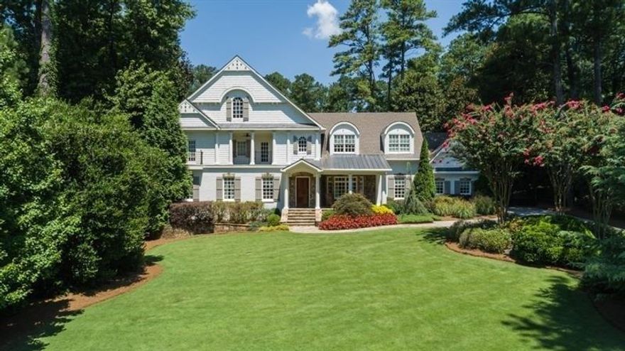 Traditional home in sought-after Sandy Springs offers oversized living spaces ideal for entertaining. Large dining rm & living rm w/stone FP & French doors leading to the pool. Kitchen has granite counters & breakfast nook. 3 beds on the main w/2 baths. Upper lvl hosts master w/ensuite bath incl double vanities, sep shower & garden tub + 2 bedrooms & shared bath. Finished basement. Outdoor kitchen, FP & 3 detached car garage w/storage. 1/1 guest apt over garage in upper lvl count. Private "park like" bkyd w/pool/batting cage/basketball/trampoline/treehouse/zip line.