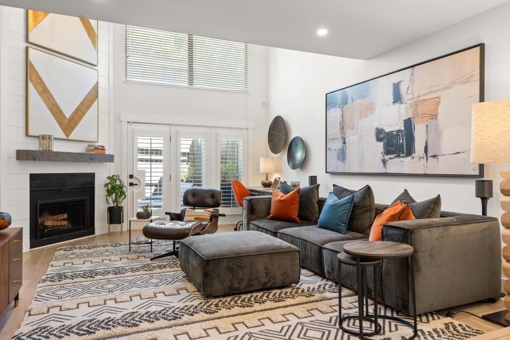 A beautiful, fully furnished 3 bedroom, 2.5 bathroom townhouse in the historic Old Fourth Ward Neighborhood of Midtown Atlanta. The 3 story townhouse with a private garage has been totally remodeled and professionally decorated. On the main level, a family room (with an 85" flat screen television and Sonos surround sound), dining area, and remodeled kitchen with quartz counters allow for easy living and entertaining. A full laundry room and half bathroom are easily accessible on this level as well. A very private primary suite with king bed, ensuite bath with walk-in shower, dual sink vanity and fifteen feet of closet space is located within the primary suite. On the third level, two additional bedrooms (both with queen beds and ample closet space in each) share a full bathroom with tub/shower combination. All three bedrooms provide blackout curtains for restful sleep and privacy. Laminate wood flooring is used throughout the public spaces and primary bedroom and new carpet has been added in the two secondary bedrooms. Finally, a private outdoor garden space with dining table, Weber grill and comfortable sofa and club seating is beautifully decorated and perfect for evening gatherings and al fresco dining. A Sonos music sound system extends throughout the home and a spin bike is available in the garage for use. Two desks: one electric stand-up desk in a secondary bedroom and one in the family room with available high-speed internet to facilitate easy remote work. The townhome community has concrete firewalls between units preventing noise from the neighboring units. Located on a quiet street near Peachtree Street and North Avenue, the home is conveniently located in the vibrant Midtown and Old Fourth Ward neighborhoods within walking distance to Ponce City Market, the Beltline, The Fox Theater, Central Park, Piedmont Park, and Emory Midtown hospital. A community dog park, Publix, Walgreens, and public tennis/pickleball courts are a five minute walk away. The home also provides easy access to Virginia Highlands, Ga Tech, downtown, and I-75 I-85.