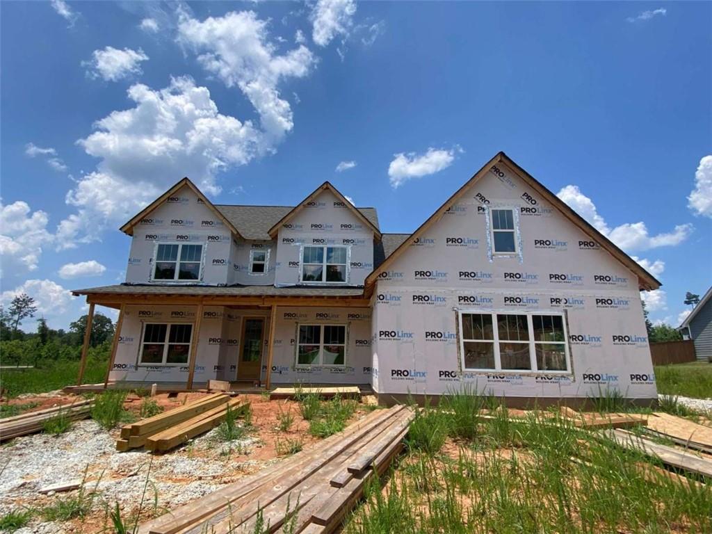 The Maple plan, proudly built by Mallard Residential, features boasts tons of curb appeal with it's two large windows, rocking chair front porch, and southern columns. This two-story layout is designed with an open concept main floor with fireplace, large island, and formal dining space. Kitchen features breakfast nook and walk in pantry. Main floor master suite has a huge bathroom and closet that connects directly to the expansive laundry room. Another secondary bed/bath combo on the main with two more bedrooms and full bath up for a total of 4 br and 3 ba. Outdoor spaces are abundant with the large front porch and covered back porch with fireplace. Each home features crown molding, soft close cabinets, solid surface counters throughout, 1 acre lot, exterior fireplace, designer lighting and plumbing packages, and all the love and care of the Mallard Res family. We look forward to meeting you. All new homes come with a Quality Builders Warranty providing coverage for up to 10 years!