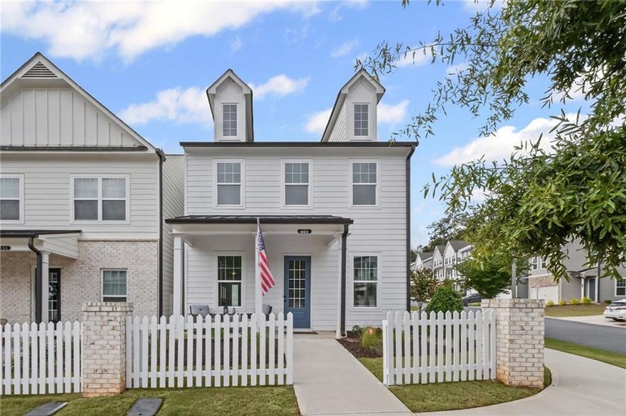 Perfect setting within Downtown Woodstock.  Walk to dining, entertainment, shops, library parks and more.   This is not your typical home in Walkers Pointe.  The property has been totally renovated since new in 2023.  Corner lot with 10 extra windows for additional light filled living.  High end luxury appointments in all rooms.  Primary Bath features a walk-in tiled shower, tile floors and walls and a large soaking tub, custom closet system.  Hall bath has tile floors and tub surrounds.  Quartzite counter tops in the kitchen, brick accent walls, and European shelving, Induction kitchen range and Boosh dishwasher.  Hardwood floors on first and second floors.  Custom wall accents in the foyer and one of the secondary bedrooms.  Coffee bar adjacent Primary bedroom for early morning ease of living.   Must see property.