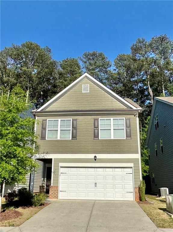 Just a little more than 2 years old single-family home with a 2 story open floor plan. Hardwood floors on the main floor throughout and stairs. A spacious family room with electric fireplace connected to the kitchen, entry half bathroom, and fenced backyard with plenty of privacy. The kitchen has stainless steel appliances, granite countertop, breakfast bar, 42’ dark wood cabinets and walk-in pantry. Expansive owner's suite with large walk-in closet, garden tub with surrounding tile, and a raised height his and her vanity. Another 2 large bedrooms share a full bathroom and a separate laundry room on the 2nd floor. Easy access to 285 & 78 and close to everywhere you need to go!
