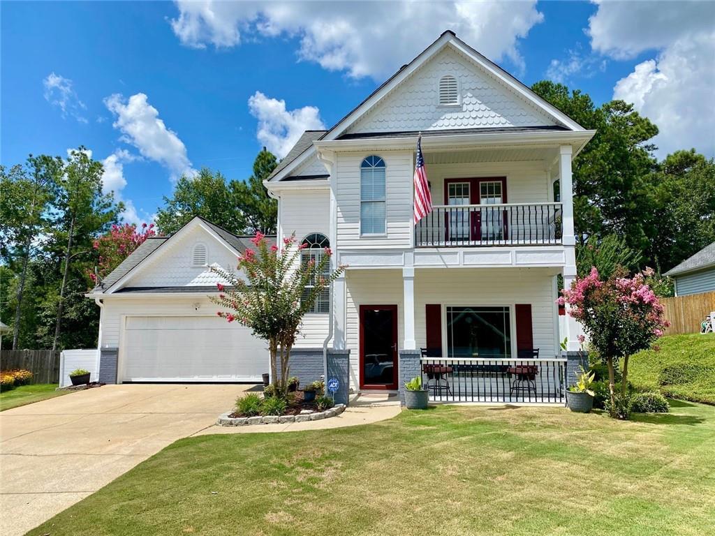 Welcome to 2156 Racoon Court, located in Mirror Lake, a 36 holes of championship golf/ swim/ tennis/ pickleball/ playground/ lake with fishing & kayaking- sailing- canoeing on 96 acre Mirror Lake/ park & walking distance to Publix neighborhood that is just 3 minutes to I-20 & 5 minutes to everything Villa Rica! This home is in great shape with enhanced or new features throughout including flooring/ painting/ granite countertops & stainless steel appliances in the kitchen/ upgraded baths/ storm doors and perhaps as good as all of these items the landscaping might be the best feature! Sodded front and back yard, with a privacy fenced back yard that offers a covered back porch/ a deck/ a firepit area/ a golf chipping & putting area in an very private setting* Newer zoned heat and air/ water heater/ toilets along with carpeting & Luxury Vinyl Planking Flooring* With several community pools, and outstanding location that is so convenient to everything, you cannot go wrong with this great home* It is truly in move in condition* You can also walk to Pine Mountain City Park where you can mine for gold or ride the miniature train*The Greatroom offers a cozy fireplace for those cool winter evenings* The 2 car garage is a spiffy* There is a Home Office (which could be used as a Dining Room if desired)* The Eat In Kitchen brings plenty of space to whip up a great meal for your guests* Upstairs the Primary Bedroom is elegant with a balcony overlooking the culdesac* The new tiled shower and jetted tub brings it all home for you* Oh yeah, there are 2 more Bedrooms and a 2nd Full Bath plus a guest half bath on the main level* Come take a look as soon as you can, you will Love this home!