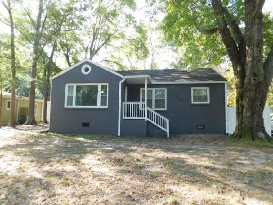 No carpets! The front entry of this charming home leads to a living room with ceiling fan. There is a separate dining room, two nice size bedrooms with ceiling fans, full hall bath with tiled tub/shower combination, tile flooring, single vanity and medicine cabinet. There is a laundry closet with a stackable washer & dryer. The kitchen has tile floors, white cabinets, Granite counters, all appliances (refrigerator, microwave, dishwasher, electric stove) and pantry/closet. There is access to the side wood deck, large level fenced yard with storage shed. Parking on driveway. Landscaping is included in the rent. Close to Historic Marietta & Marietta Square and 5 minutes to Kennestone Hospital.  No aggressive dog breeds.