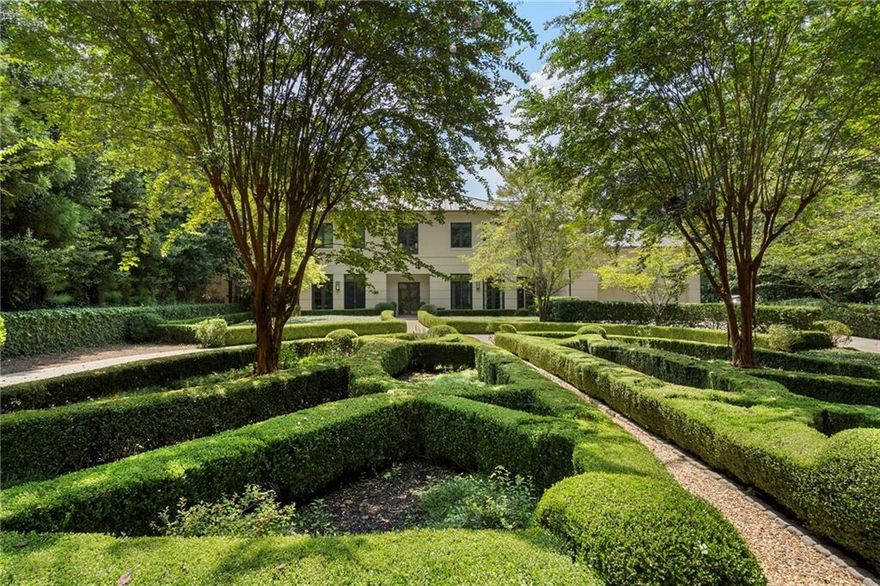 Beautifully designed custom home in Buckhead, situated on a private 1-acre lot. This stunning modern-transitional residence was meticulously crafted by AFG Builders under the thoughtful guidance of Harrison Design. This home showcases timeless architectural design and exquisite craftsmanship. As you step into the two-story foyer with stone floors on the main level, you're greeted by the open living room space featuring 12 foot ceilings and a wall of glass with doors that walk out to the pool. The quality of construction is evident, featuring triple-locking solid wood doors throughout. Beyond the pool, you'll find a spacious fenced yard that's part of the property, offering the perfect space for activities like pickleball.  The main floor has a second primary bedroom with french doors out to the pool as well as the main primary bedroom suite upstairs.  The primary bedroom upstairs features  a study, fireplace, a private terrace and two exceptionally large dressing rooms. Additionally, there are three secondary bedrooms, each with an ensuite full bathroom, provide ample accommodation options. An elevator conveniently connects all three floors. The all glass second stairwell lets in exceptional lighting and is a sculptural masterpiece in itself.  The main stairwell is signature Harrison Design with large windows and a wrap around stair up to the second floor primary suite.
The dining room opens to the garden and grilling area, creating a seamless connection between indoor and outdoor living spaces. The sleek kitchen and breakfast room feature gorgeous countertops, stainless steel appliances, custom cabinetry, a large walk-in pantry and separate coffee bar station. The family room, complete with a fireplace, opens to an enclosed screened porch next to the pool. Additional outdoor amenities include a pool bath and an outdoor shower. 
The daylight terrace level is an entertainer's dream, offering a kitchen, billiards area, fireplace, wine cellar and a full bath. It also serves as an excellent guest apartment.  An additional room can be used as a media room, gym, or golf simulator space.  This custom eco-conscious home was constructed with sustainability in mind. Features such as insulated concrete exterior walls, icynene insulation in the attic for airtight energy efficiency, a standing seam metal roof, solar panels for water heating, and a circulating hot water system for reduced water usage exemplify its commitment to sustainability. Throughout the home, you'll find earth-friendly materials like recycled glass and sustainable woods, including alder doors/windows and lyptus floors. Located in the highly sought-after 30327 zip code on the West side of Buckhead, this property boasts the most coveted address in the area.  Embraced by a lush tree canopy, the estate-sized lots surrounding this home provide an enchanting natural setting. Its prime location offers easy access to all that Atlanta has to offer, including top-notch restaurants, excellent schools, a mere 30-minute drive to the airport, and much more.
