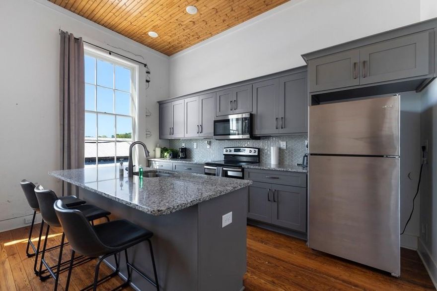 Executive 2 bedroom, 2 bath loft overlooking historic Downtown Cartersville. Fully furnished and recently renovated. Flexible lease terms available. Private entrance with direct access to downtown restaurants, shops, and entertainment. Minutes to I-75 and LakePoint Sports.

Loft features include an in-unit washer and dryer, fully equipped kitchen (refrigerator, coffee maker, cookware, dishes, and utensils), central heating and air, and a dedicated workspace available in a shared common area. Utilities included except Wi-Fi (available for $45/month). Scenic city views overlooking historic downtown.  

NO SECTION 8 VOUCHERS ACCEPTED.
BASIC QUALIFICATIONS:
Government issues ID, Gross Income 3 x Monthly Rent, all occupants 18+ MUST apply, positive rental history, $250 Leasing fee per lease once accepted, Pets are welcome-Restrictions apply!
No evictions or bankruptcies within prior three years.
Security deposit alternatives are available though Lighthouse; a modern budget-friendly alternative to traditional cash deposits!
Our valued tenants get access to our exclusive Tenant Benefits Program.
Pets are welcome!