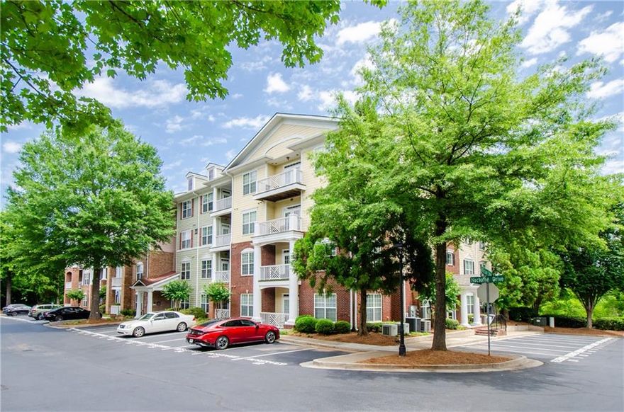 This condo in a prime Alpharetta location is updated and inviting with its open floor plan, light-filled space, freshly painted walls, newly installed floors and expansive vaulted ceilings. Overlooking the open living space and versatile dining area, the renovated kitchen boasts quality brand new white cabinetry and new granite countertops, stainless steel appliances, and a spacious pantry. A private porch extends your living space outdoors and boasts views of greenery in every direction. The condo boasts a thoughtfully designed layout with one bedroom and bathroom, a powder room and a dedicated home office space. The full updated bathroom showcases modern vanities, stand alone tub, stylish tile and polished hardware. This neighborhood is in a great Alpharetta location close to restaurants, retail and entertainment opportunities. Take advantage of nearby green space and trails at the Big Creek Greenway, concerts throughout the year at Ameris Bank Ampitheatre, shopping at North Point Mall or the Avalon, and get anywhere around town with easy access to GA-400! Additional amenities include assigned parking and ample guest parking, secured entry and easy elevator access for peace of mind and everyday convenience, and the community pool. Experience low-maintenance living and everyday convenience at this updated and refined condo at the Westside Commons.
