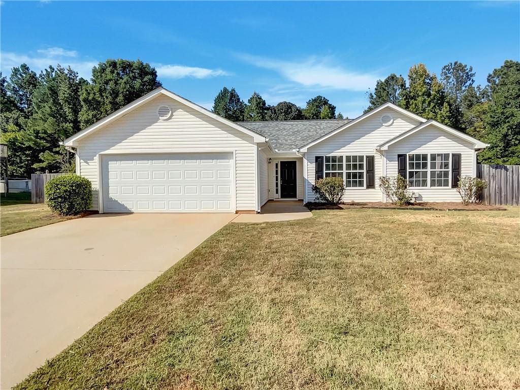 Discover this inviting 3-bedroom, 2-bath ranch on a generous half-acre lot in Covington, offering the perfect blend of comfort, updates, and convenience—all with
no HOA.
From the moment you step inside, the vaulted family room with a cozy fireplace sets a warm and welcoming tone, creating a perfect gathering space that flows
seamlessly into the dining area. The kitchen features bright white cabinetry and stainless steel appliances, providing a clean, modern feel with plenty of space for
everyday cooking or entertaining.
The primary suite is a peaceful retreat, complete with a tray ceiling, spacious walk-in closet, and a private bath featuring a double vanity, separate soaking tub, and
shower. Two additional bedrooms share a full bath, making them ideal for family, guests, or even a home office.
Step outside to enjoy the patio overlooking a large, level, fenced-in backyard. Whether you’re hosting a cookout, letting pets run freely, or enjoying quiet evenings
outdoors, this backyard offers plenty of possibilities. The property also includes two storage sheds, providing ample space for tools, lawn equipment, hobbies, or even
a small workshop—an added bonus for homeowners needing extra room.
This home has been thoughtfully updated with a new water heater, fresh interior paint, and new LVP flooring, giving it a move-in-ready feel with modern touches.
All of this is located just minutes from Downtown Covington, where you can explore local shops, restaurants, and entertainment, while still enjoying the privacy and
space of your own property.