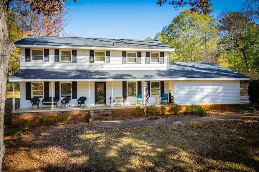 Welcome to 4049 Roy Court! This charming 4 bedroom, 2.5 bath home is nestled in a desirable established Douglasville neighborhood known for its large lots and mature trees. Step inside to find real hardwood floors, a spacious Family room, and a bright sunroom that's perfect for relaxing or entertaining. The separate dining room offers plenty of space for gatherings, while the well-appointed kitchen provides functionality and comfort.New roof and HVAC in 2024 Over 2300 square feet of living space.. Enjoy peaceful living just minutes from shopping, dining, and I-20.