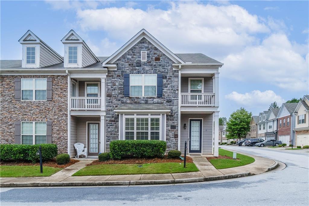 Imagine stepping into a stunning 3-bed, 2½-bath townhouse nestled in the charming Renaissance at South Park community in Fairburn, GA—a place that blends refined style with Southern hospitality and convenience. From the moment you enter, you’ll be greeted by a sophisticated foyer framed by graceful columns and leading into an open-concept living and dining space. Elegant hardwood or tile floors flow seamlessly, mingled with coffered ceilings and thoughtful architectural touches that elevate everyday living. At the heart of the home lies a gourmet kitchen that’s both practical and luxurious. Expect beautiful granite countertops, a generous island, 42? cabinetry, modern appliance packages, and stylish backsplashes—perfect for entertaining or casual meal prep. Your master suite is a private haven upstairs—accessible through French doors and featuring a spa-like bathroom with dual vanities, a separate shower, tiled flooring, and a serene garden tub for unwinding. Step out to your fenced backyard or private patio—great for relaxing or hosting a cozy gathering. The versatile loft (or family room) upstairs adds flexible living space for a playroom, gym, or additional lounge. The community is rich with lifestyle amenities: a pool with beach-style entry, tennis courts, clubhouse, playgrounds, and walking trails, all under the care of a professionally managed HOA. Residents enjoy a peaceful, well-kept environment, nestled among quiet streets, mature trees, and easy access to everyday conveniences. Perfectly positioned just off I-85, you're under 30 minutes from downtown Atlanta and mere minutes from Hartsfield-Jackson Airport. Family adventures await nearby at the beloved Georgia Renaissance Festival—a beloved local tradition that brings medieval charm each spring. This townhouse offers the best of both worlds an elegant, open-plan living space with upscale finishes and a masterful layout, all nestled within a vibrant, amenity-rich community. It’s not just a home—it’s a lifestyle upgrade.