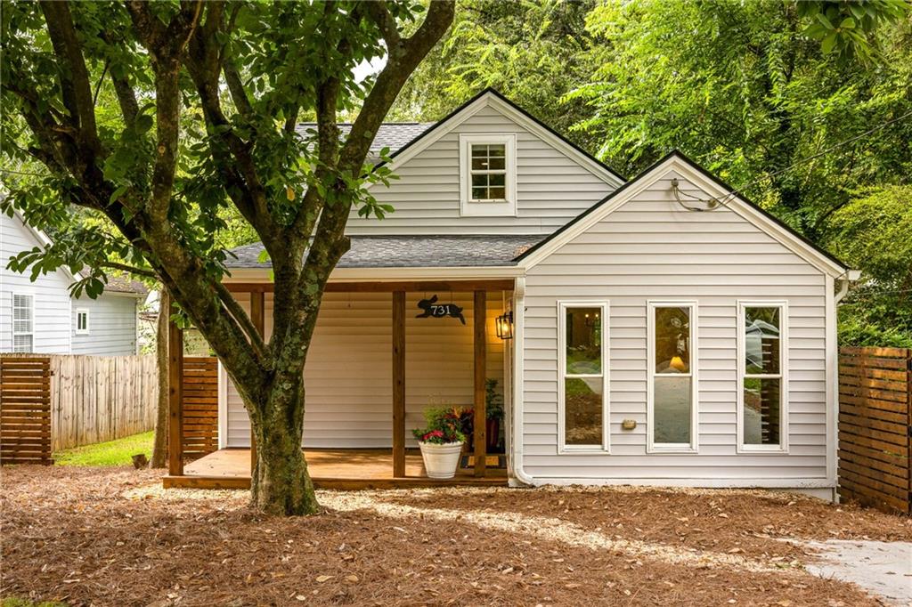 Incredible opportunity to own a single-family home just a 5 minute walk from the Beltline for under $500k. From the second you step foot on the gracious front porch, it just feels like home. The perfect spot to unwind and enjoy a cool beverage in the shade. Step inside and you're greeted by the perfect blend of open-concept living while still enjoying defined spaces. The entryway sunroom gives you plenty of breathing room when you enter the home with floor the ceiling windows your plants will be thrilled to live here. The living room features a stunning arched opening, straight from your Pinterest board, that leads into the separate dining room. Plenty of space to host your friends and family for the upcoming holiday season. The kitchen has recently been fully updated to include quartz counters, zellige style backsplash, brand new cabinets, and even has an actual vent hood, amazing! Rounding out the main level you'll find two bedrooms connected by a jack-&-jill bathroom as well as a moody green powder room for you guests to use. Upstairs you'll find the primary retreat with built in cabinetry and calming paint scheme, you can relax from the day in your private escape. The bathroom features a gorgeous mid-century double vanity and cute-as-a-button penny tile shower with brass hardware. Out back, the perfect sized back yard, fenced for your dog, but not too big to maintain. If you aren't familiar with Boulevard Heights let me fill you in. Located just south of Grant Park & Ormewood Park this Beltline neighborhood is very tight knit and peaceful. Just a 5 minute walk to the Southside Beltline Trail (currently being paved with construction planned to be completed this calendar year) you can easily access the rest of the city by bike or foot. Just a 5 minute walk to FiNCA to FiLTER (coffee), Side Saddle Wine Saloon, Mellow Mushroom Pizza, and Condessa Coffee with more development on the way. Welcome home! Seller offering $4,500 towards Buyer's closing costs with use of preferred lender, ask listing agent for more information.