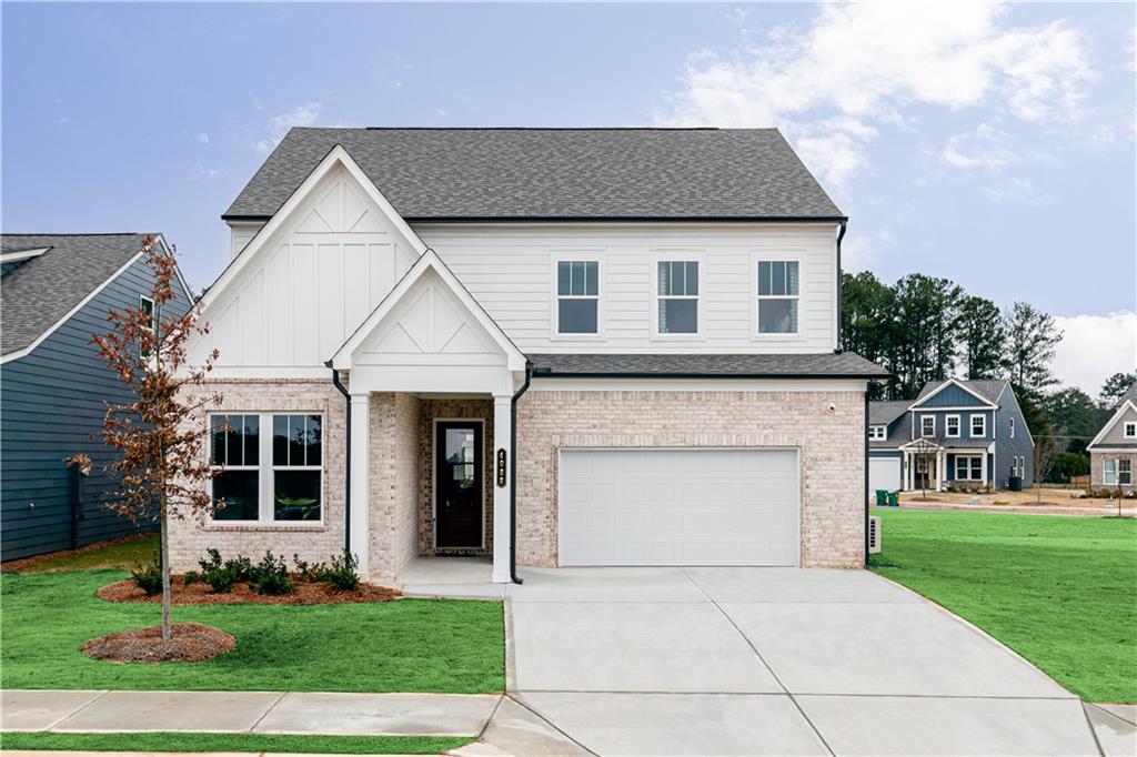 Welcome to Madison at Buice Lake, the new Stanley Martin Master Planned Community in Acworth, GA!
LOT 39. ALL IN - ZERO HIDDEN PRICING. ESTIMATED COMPLETION DATE IS OCTOBER 2025.
In the MAISIE flooorplan, you can mix and mingle with friends and family in your open-concept first floor, which includes a kitchen overlooking the family room and dining area. A bedroom at the front of the home can be used for guests to have their own private space.
Upstairs, the owner’s suite boasts a large walk-in closet off the en suite bathroom with double vanities. Three other bedrooms provide the perfect place for family or friends to rest their heads at night. Plus, take the chore out of doing the laundry with a conveniently located laundry room on the upper level! A full bathroom and an additional flex space as a play space, home office or crafting nook, to name a few – it’s truly what you make of it!
Some of the SMart Selected design options in this home include a gourmet kitchen & center island, large owner's suite with walk-in closet and en suite bath, patio, main level guest suite with full bath, and upper-level flex space.
*Photos are shown of a similar home