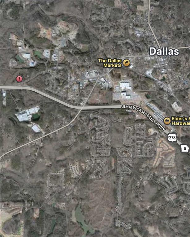 4.47± Acres – PRIVATE HOMESTEAD or Light Industrial / Commercial Development Opportunity in Paulding County, GA
This 4.47± acre parcel at 1160 W Memorial Drive offers a rare, shovel-ready vision for transformation into a light industrial and commercial hub. Currently zoned R-2 (Suburban Residential), the property has strong potential for rezoning to I-2, unlocking opportunities for small warehouses, drive-thru retail, and other light commercial uses.
The concept master plan seen in the photos envisions:
42,000± sq ft of warehouse space across multiple 1,500–2,500 sq ft units
4,800± sq ft of commercial space, including an 800 sq ft drive-thru shop and a 4,000 sq ft retail package store
Ample parking with 77 planned spaces (exceeding county requirements)
Strategic placement for billboard advertising along Memorial Drive and Hwy 278
Engineered detention pond and state waters buffer compliance for environmental stewardship
Located inside Paulding County (not the City of Dallas), the property benefits from lower taxes while maintaining close proximity to major corridors, retail centers, and residential neighborhoods. High traffic counts along Hwy 278 make this site ideal for businesses targeting both commuter and local markets.
Whether pursued as a multi-tenant industrial park, mixed-use commercial complex, or single-user facility, this property delivers exceptional location, infrastructure potential, and growth upside.