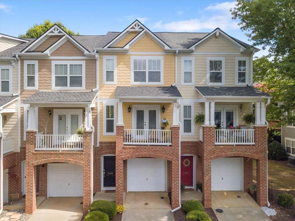 A beautiful listing in Alpharetta/Milton Georgia region. Enjoy this AMAZING townhome in the Alpharetta community. A home completely renovated from the roof to the AC, from the floors, to the kitchen, from the kitchen to all bathrooms and stunning lighting throughtout. This is the townhouse of choice in the Wyndham subdivision. The main area of this home features an eat-in-kitchen/dining area, a kitchen bar, and a liiving room with a fireplace. Even the lighting and ceiling fans in this home have been perfectly designed. Next, the cabinets and floors in this home are completed renovated, The quartz counter top and new backsplash makes this contemporary living most enjoyable. The stunning kitchen faucet and double sink will have you enjoy cooking and entertaining even as you sit on your kitchen balcony treasuring the view of the beautiful trees from your balcony or sitting on your deck off the living room. Also, the guest powder-room on the main floor is completely renovated from the toilet to the cabinet. The upstairs two bedrooms have new flooring and the bathrooms completely renovated. The downstairs extra bonus room/bedroom is perfect for a bedroom, office or exercise room as it leads out doors for entertaining or a sweet BBQ. The Cambridge High School District in the well sought-after Wyndham community is just minutes from shopping, dining and the Windward Parkway, Halcyon, and the Big Creek Greenway. The one-car garage provides additional storage and more parking is available as part of the Wyndham amenities which also includes swimming, and a playground area to walk your pet. Once you live in this community you will not want to leave.
