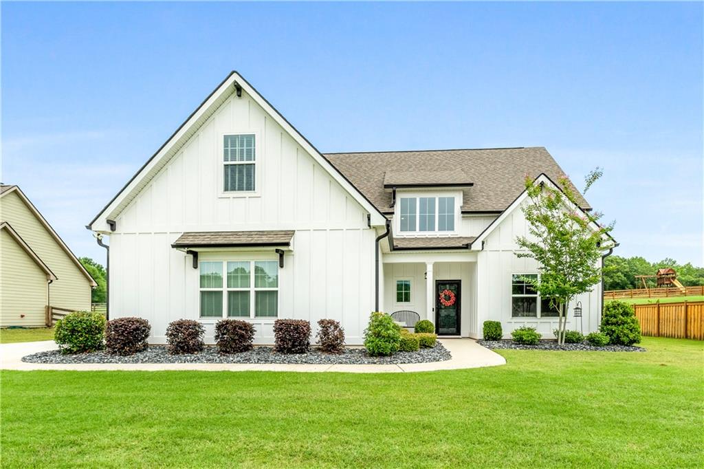 STOP THE CAR, WHAT!!?? You will NOT find another 4 bedroom (with potential 5th bedroom) home only 4 years old IN SENOIA AT THIS PRICE! Motivated Seller! ***PREFERRED LENDER IS OFFERING $3000 AT CLOSING*** Call to find out more details about this amazing offer! Spacious & Stylish in Senoia's Graceton Farms - Over 1 Acre Lot! Welcome to your dream home in the desirable Graceton Farms community of Senoia! This beautifully maintained home offers nearly 3,000 square feet of thoughtfully designed living space, plus a flexible bonus room (pre-wired for home entertainment) that could serve as the 5th bedroom, media room, or home office. Set on a generous 1+ acre lot, this home features a large backyard with a covered back patio, perfect for outdoor entertaining, gardening, or simply enjoying peaceful country-side evenings. Less than 4 years old, this home blends modern construction with timeless style including regular HVAC maintenance, Nest thermostat and USB outlets throughout. You'll love the open-concept layout, abundant natural light, and upscale finishes throughout. The kitchen, living, and dining areas flow seamlessly, ideal for everyday living and hosting guests. Located in a top-rated school district, and just minutes from shopping, healthcare, dining, and more, this home offers the perfect balance of convenience and tranquility. Don't miss your opportunity to own this spacious gem in one of Senoia's most sought-after neighborhoods! Schedule your private showing today!