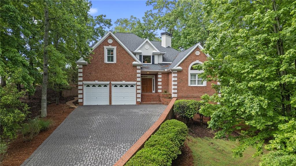 7830 Kings Point Drive, Cumming, Georgia image 1