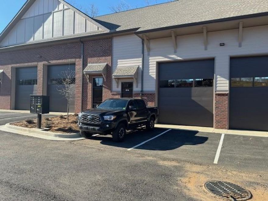 Brand new construction. This warehouse, office, flex space has everything you need and is in an amazing Alpharetta location. Located near Alpharetta/ Cumming boarder and central to Highway 400 access. This unit is 1250 square feet, 25 feet wide by 50 feet deep. It has a massive 12x14 insulated drive through bay door and 20 foot ceilings inside. Entire warehouse space is heated and cooled. Nice private ADA half bathroom with a tankless water heater. Utility/Laundry Sink. Fire protection with sprinkles in warehouse. Breaker panel has extra circuits if need be.  Rent is $2800 monthly plus $2000 annual CAM fees.  Insulated walls and ceilings, Hose bib at interior of overhead door. Perfect for Industrial, personal use, warehouse use, manufacturing, or hobby!