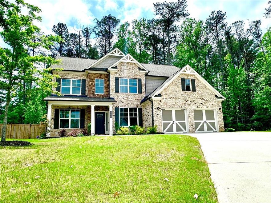 This home is the beautiful Georgetown floor plan by Paran Homes. It is a two-story home that features 5 bedrooms, 4 bathrooms and a 2-car front-entry and kitchen-level entry garage. On the exterior, it features a full front porch, covered rear patio and the spectacular salt-water swimming pool with fountains and an LED lighting system that is also gas heated for year round enjoyment. It also features a fully fenced yard. The interior's main floor is perfect for entertaining with an open floor plan, gourmet kitchen that flows into the great room. The kitchen features a huge granite prep island, 42-inch cabinets, a cooktop and double ovens. There is also a guest en suite on the main level. The second floor has an owner's suite with sitting area and secondary bedrooms. The homesite is a premium cul-de-sac location. This home is located in a top-rated school district offering exceptional educational opportunities and a strong sense of community.