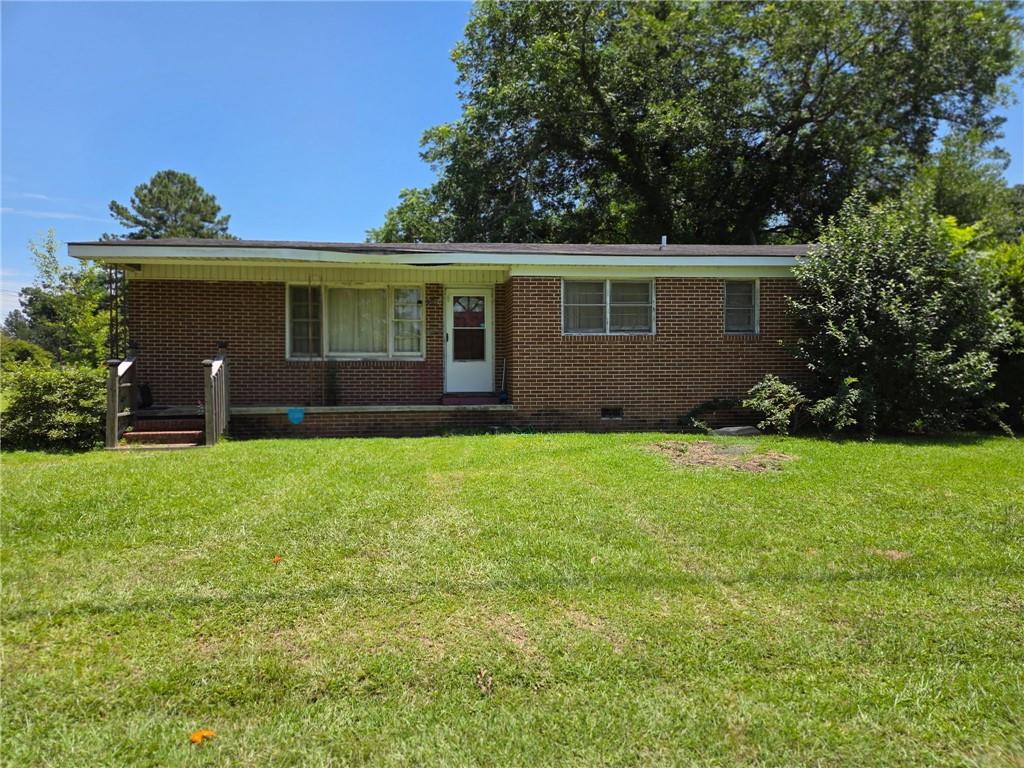 Investors Special! Don’t miss this opportunity to own a 4-bedroom, 2-bath brick ranch with tons of potential. This single-story home offers a solid layout-perfect for a renovation or rental project. Sold as-is, ready for your vision and updates. Bring your best offer!!