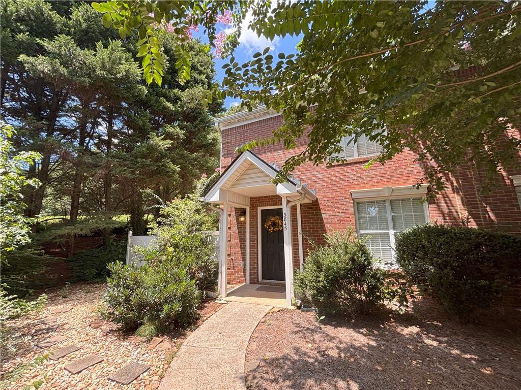 Welcome home to Carefree living in this 3 bedroom, 2.5 bath townhouse in the FORSYTH CENTRAL HIGH SCHOOL DISTRICT. FAMILY ROOM WITH FIREPLACE, BEAUTIFUL LVT wood floors throughout the main level and like new carpet upstairs. Great kitchen area with white cabinets, granite counters and stainless steel appliances. 2 very nice bedrooms that share a hall bath. Master Bath features, 2 sinks updated with granite and new fixtures! 1 car carport with storage closet! LARGE FENCED BACK YARD!!!!!! Close to GA 400, shopping, restaurants, Mary Alice Park, Northside Hospital. Priced to sell---must see to appreciate. POOL, PLAYGROUND, TENNIS COURTS, GREEN SPACE AND SIDEWALKS THROUGHOUT! LOW HOA FEES!